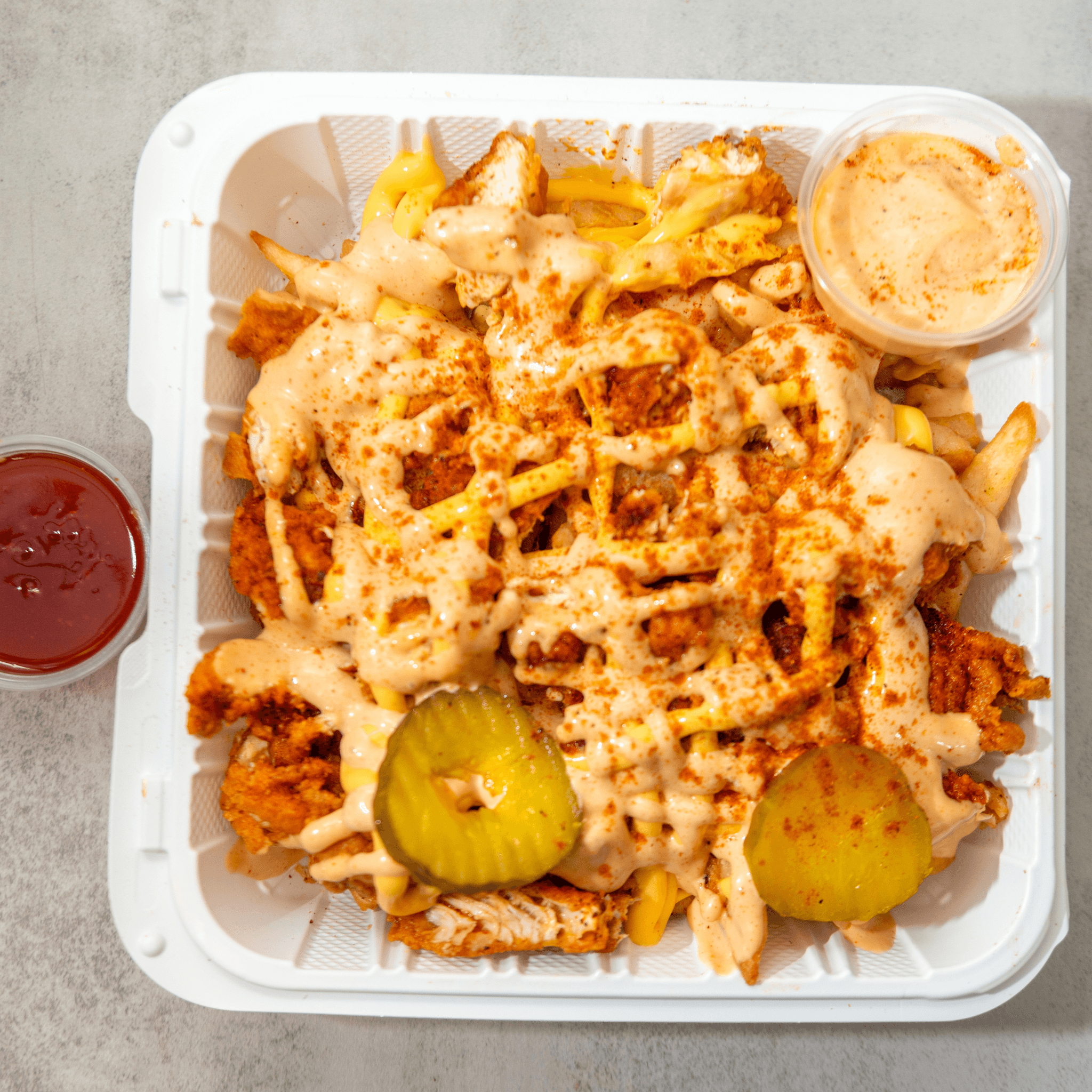 Chicken Tenders Loaded Fries.